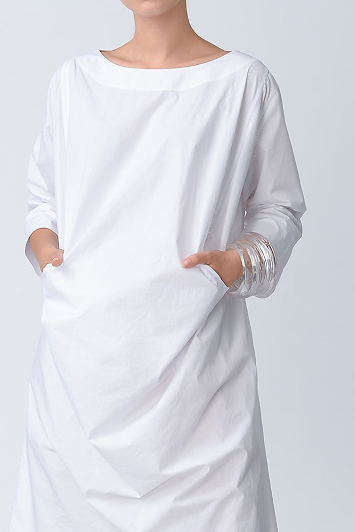 White Cotton Vacation Dress With Cone Pockets by Rajesh Pratap Singh at Pernia's Pop Up Shop