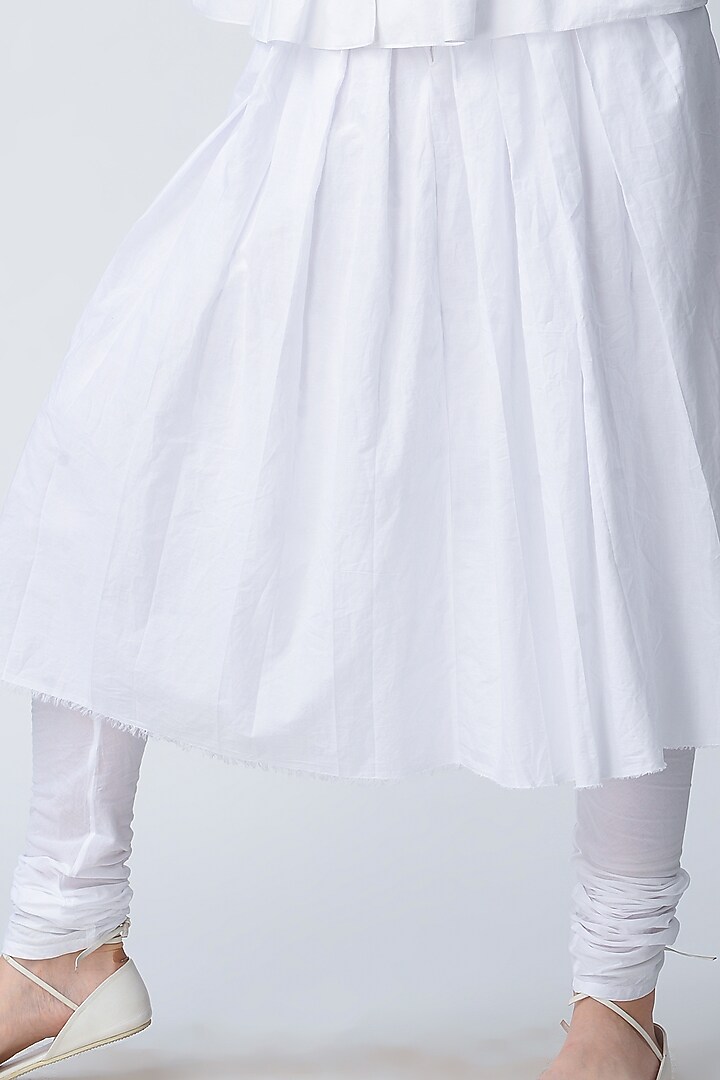 White Pleated Skirt With Inner Pants by Rajesh Pratap Singh at Pernia's Pop Up Shop