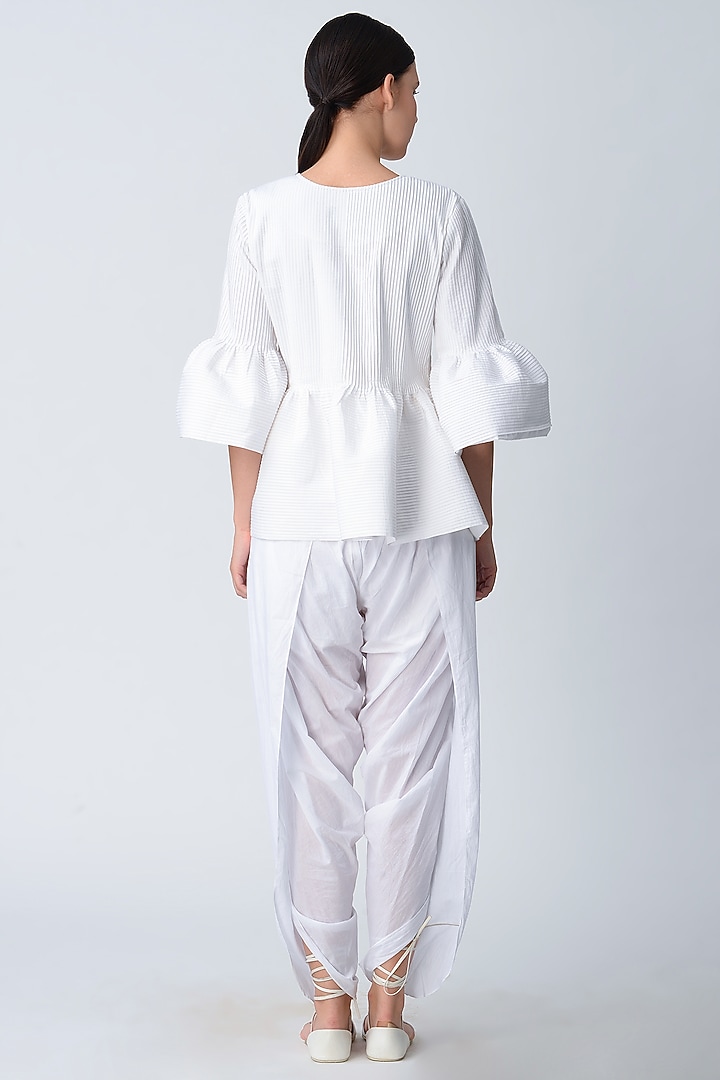 White Pleated Peplum Jacket by Rajesh Pratap Singh at Pernia's Pop Up Shop