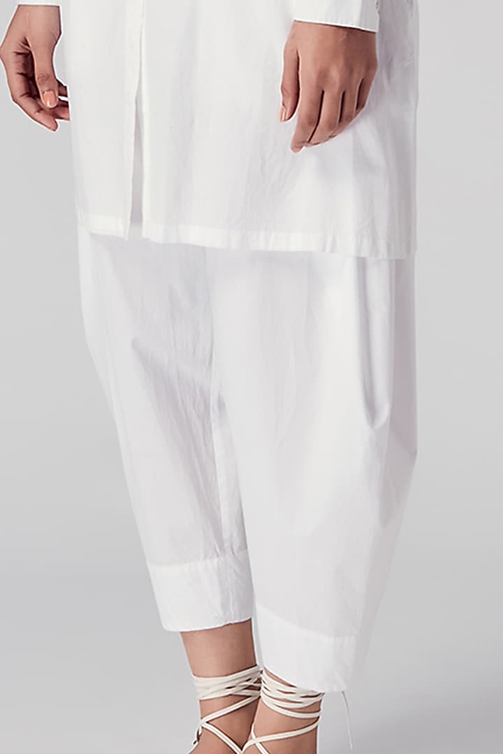 White Pleated Salwar Pants by Rajesh Pratap Singh at Pernia's Pop Up Shop