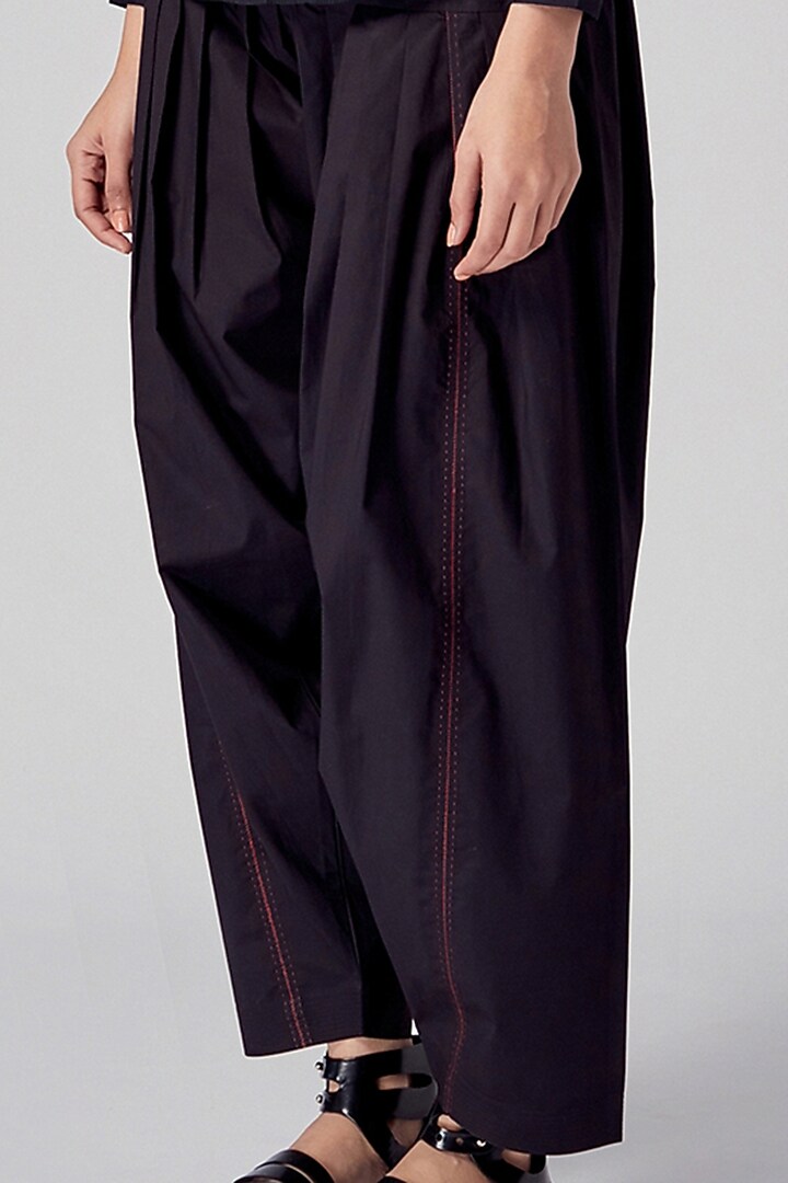 Black Pleated Pants by Rajesh Pratap Singh at Pernia's Pop Up Shop