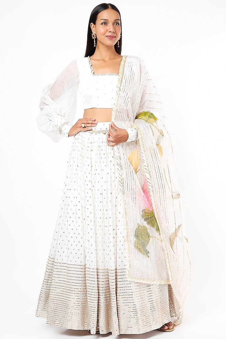 Off-White Embroidered Lehenga Set by Roopa Sharma