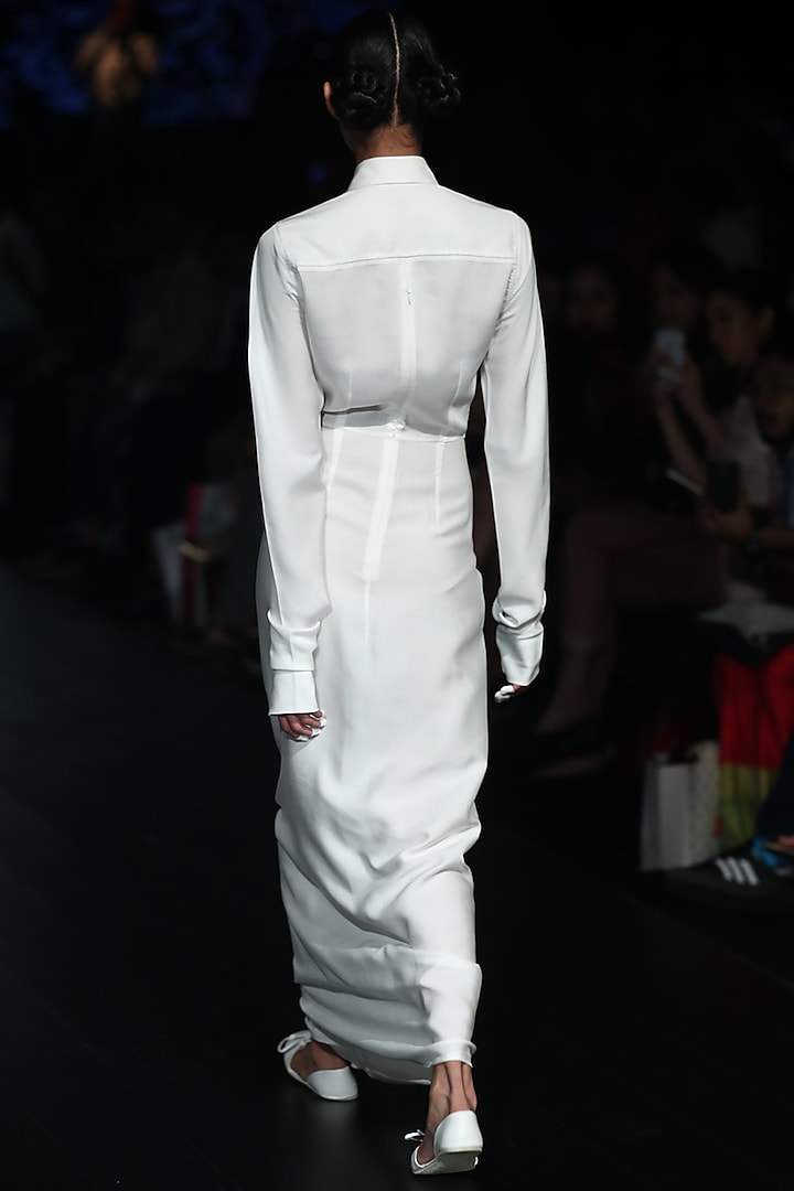 White knotted dress available only at Pernia's Pop Up Shop.
