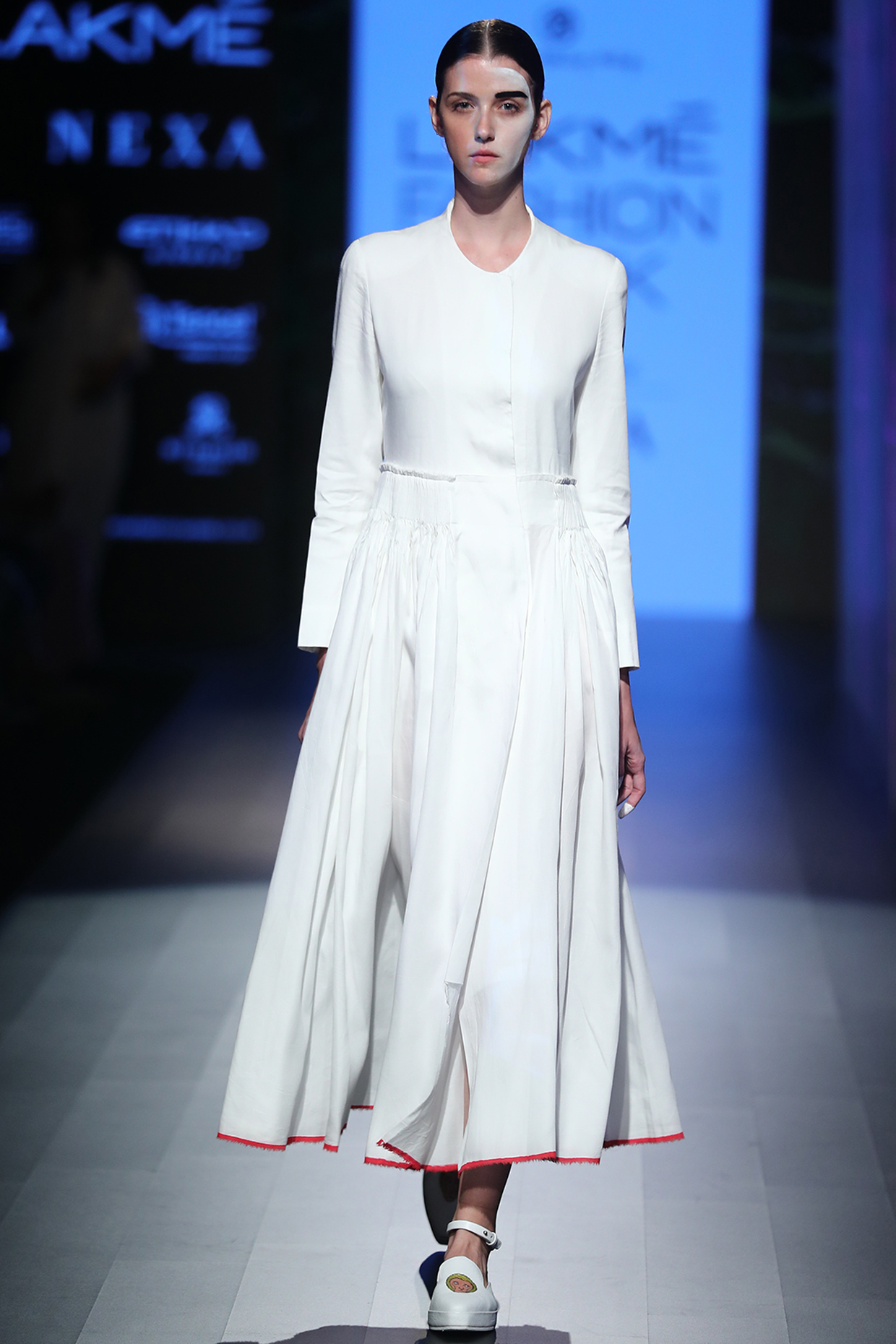 White maxi dress available only at Pernia's Pop Up Shop.