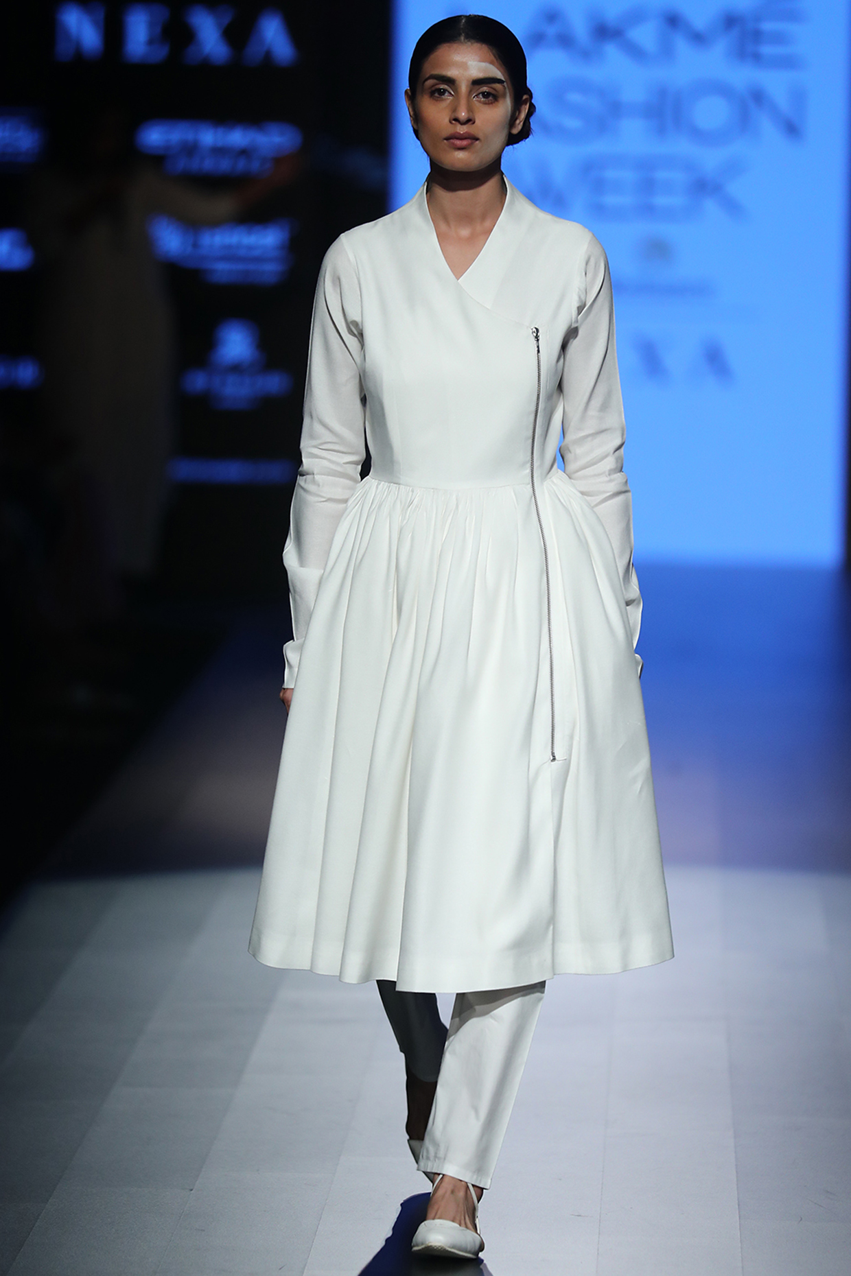 White gathered jacket available only at Pernia's Pop Up Shop.