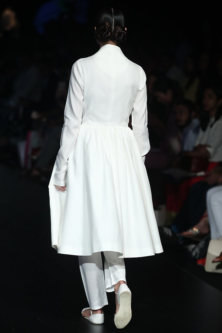 White gathered jacket available only at Pernia's Pop Up Shop.
