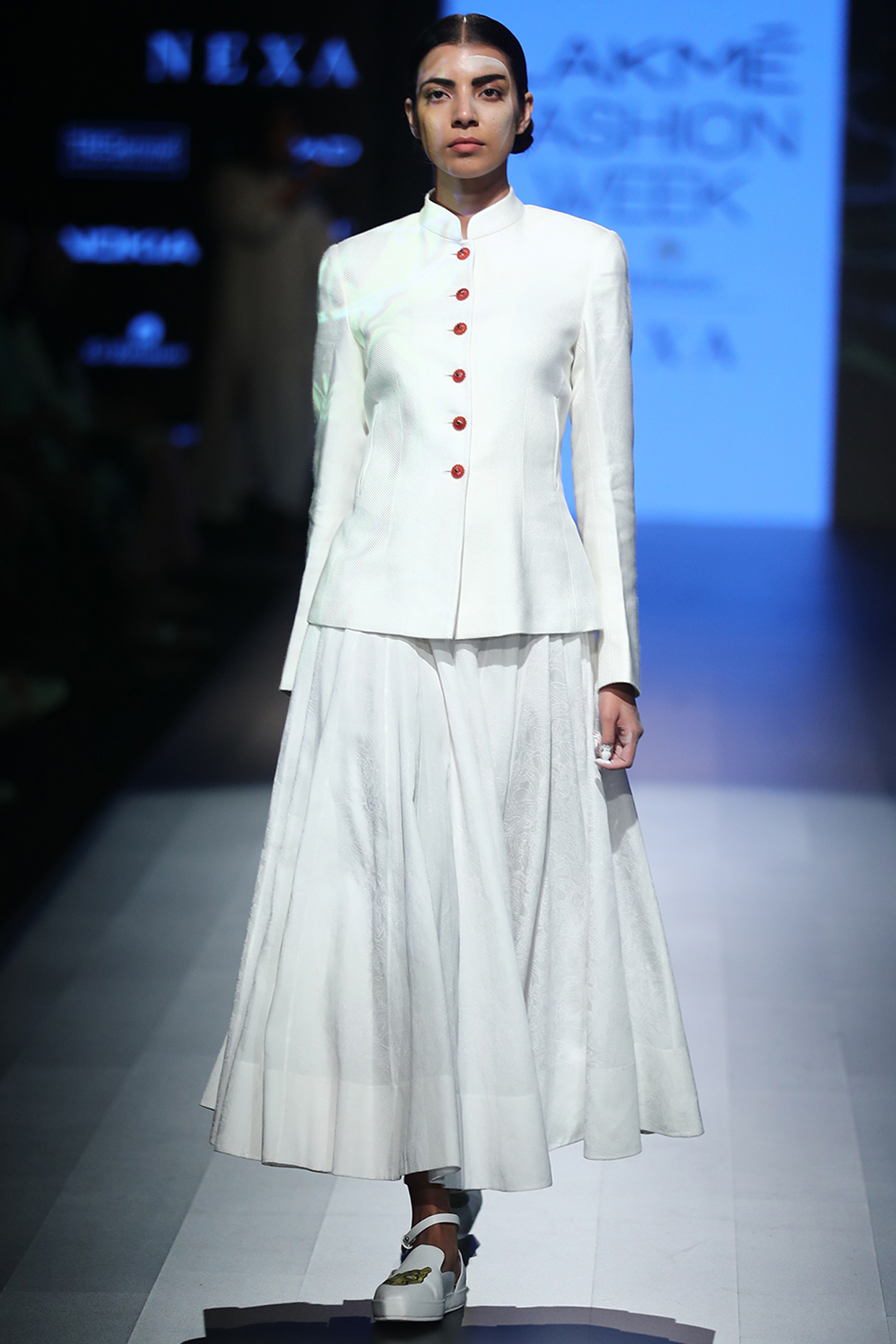 White fitted jacket available only at Pernia's Pop Up Shop.