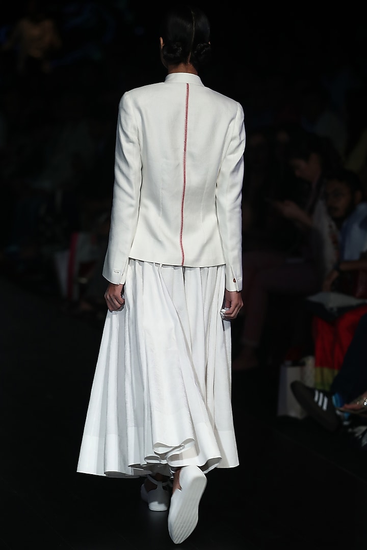 White fitted jacket available only at Pernia's Pop Up Shop.