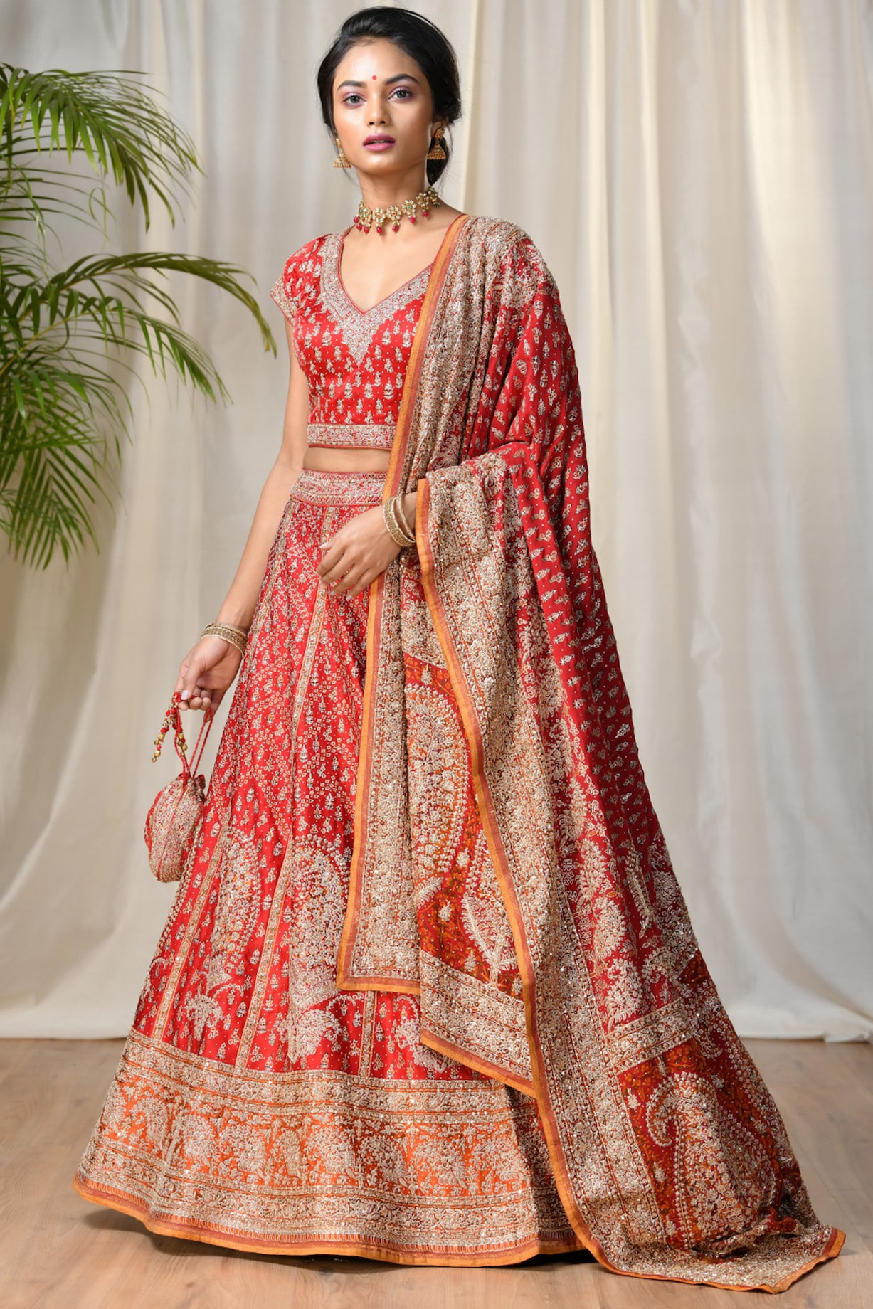 Red & Saffron Embroidered Bridal Lehenga Set by Ri Ritu Kumar at Pernia's Pop Up Shop 2026 Red & Saffron Embroidered Bridal Lehenga Set by Ri Ritu Kumar at Pernia's Pop Up Shop 2026