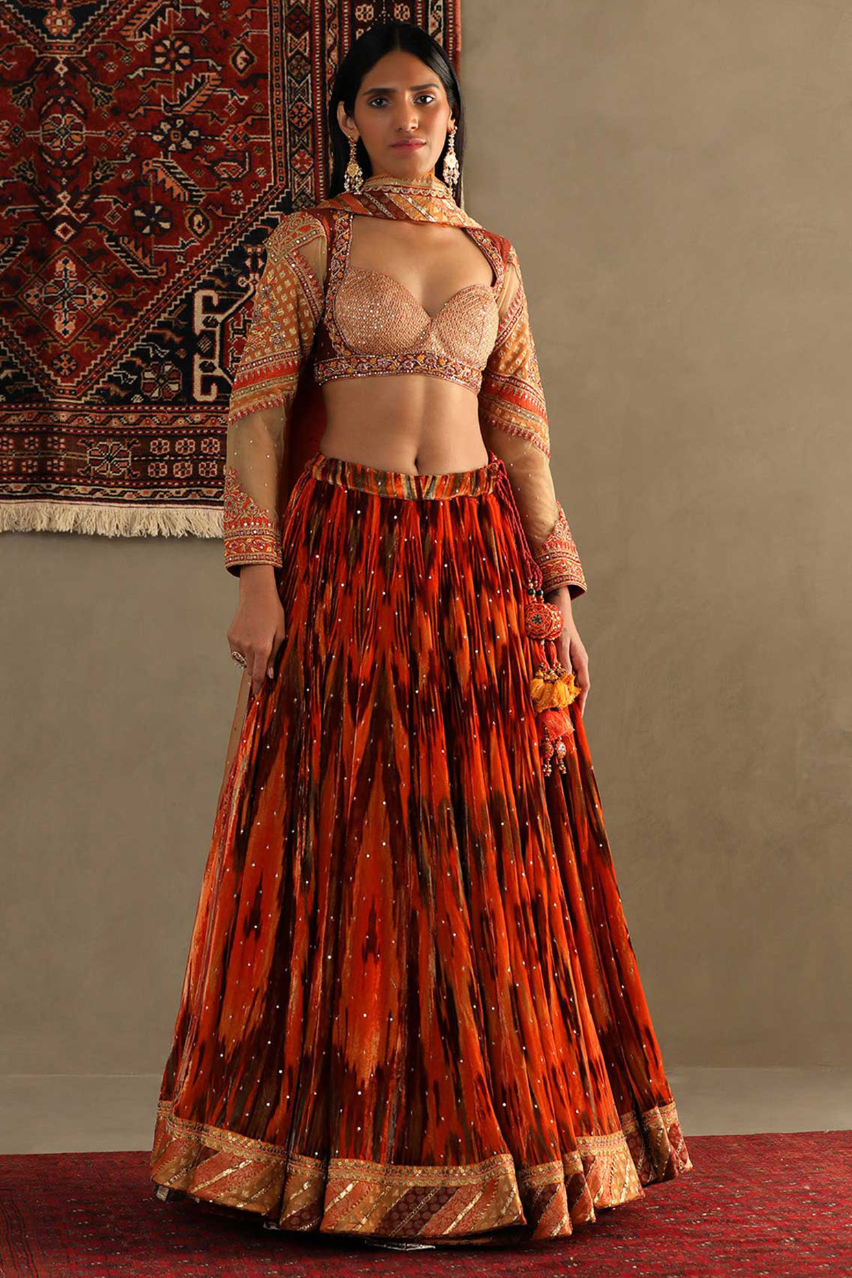 Amber Orange Silk Machine & Hand Embroidered Bridal lehenga for 22 Lehenga Set by Ri Ritu Kumar at Pernia's Pop Up Shop