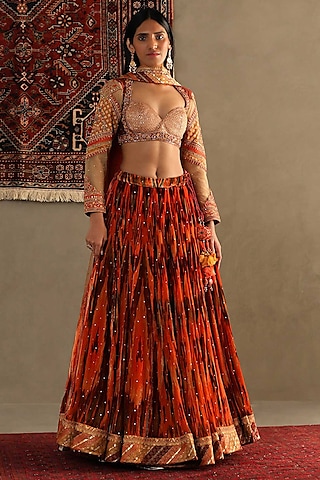 Amber Orange Silk Machine & Hand Embroidered Lehenga Set by Ri Ritu Kumar