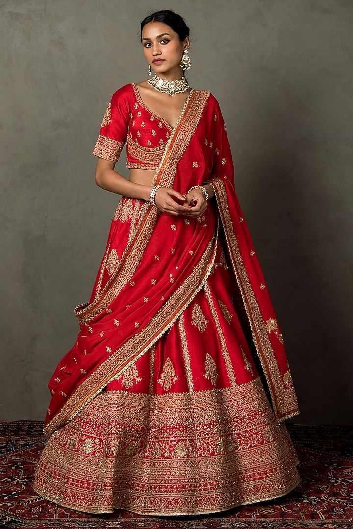Red Silk Dupion Hand & Machine Embroidered Bridal Lehenga Set by Ri Ritu Kumar at Pernia's Pop Up Shop