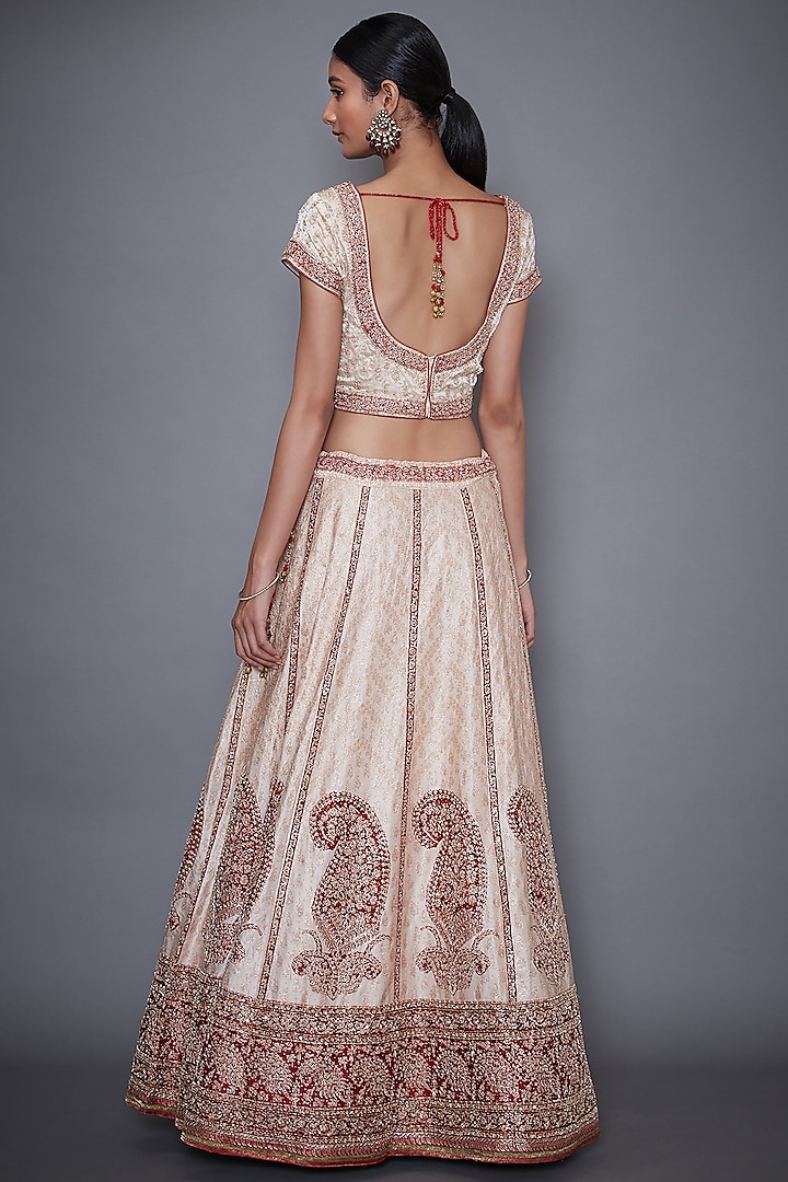 Off White & Red Embroidered Bridal Lehenga Set by Ri Ritu Kumar at Pernia's Pop Up Shop