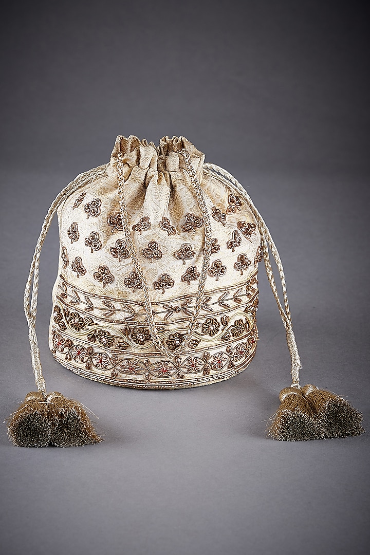 Off White Brocade Embroidered Potli by Ri Ritu Kumar at Pernia's Pop Up Shop