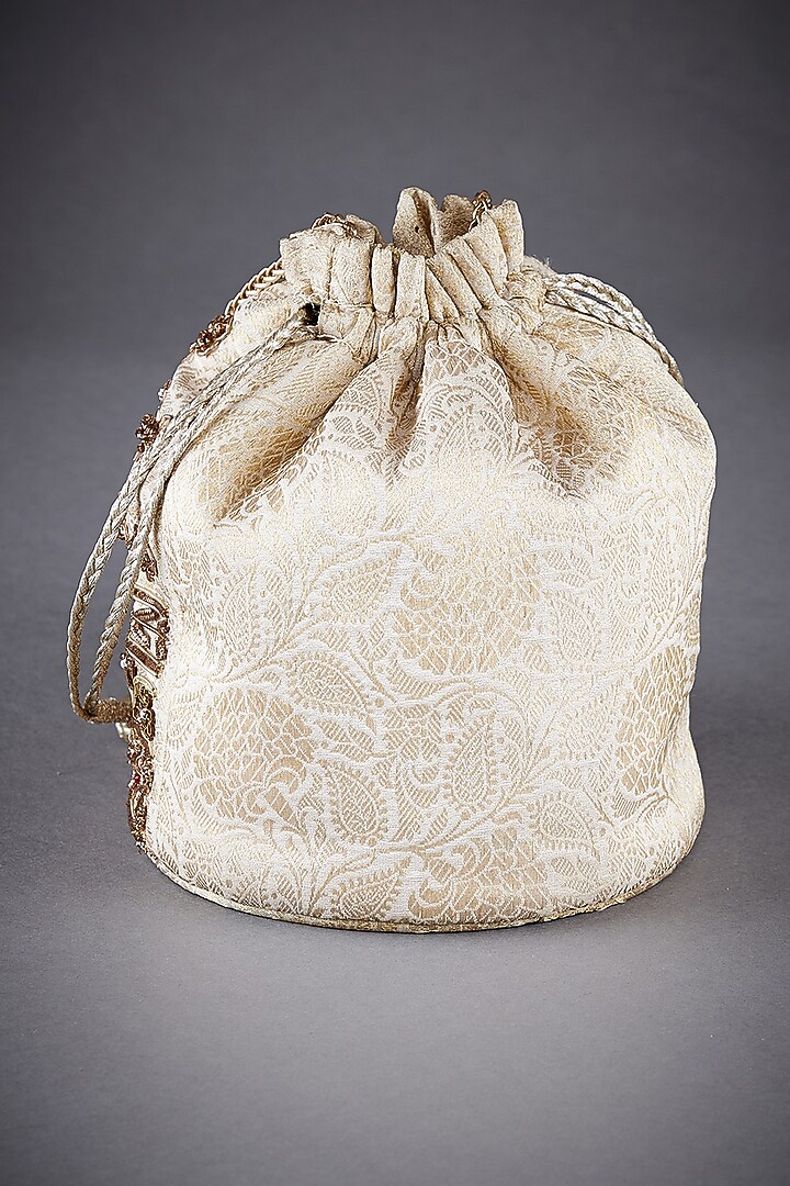 Off White Brocade Embroidered Potli by Ri Ritu Kumar at Pernia's Pop Up Shop