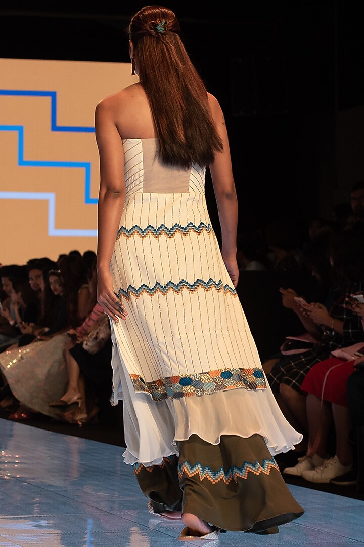 White Embroidered Tunic With Green Pants by Rajni Suyach at Pernia's Pop Up Shop