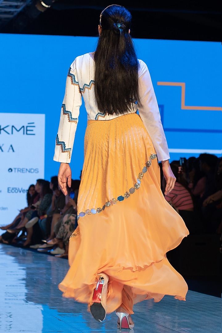 White Embroidered Crop Top With Yellow Skirt by Rajni Suyach at Pernia's Pop Up Shop