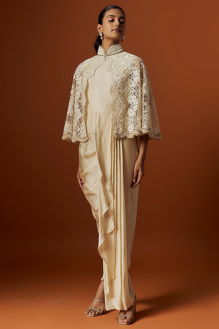 Ivory Satin Draped Gown With Cape by Rashi Kapoor