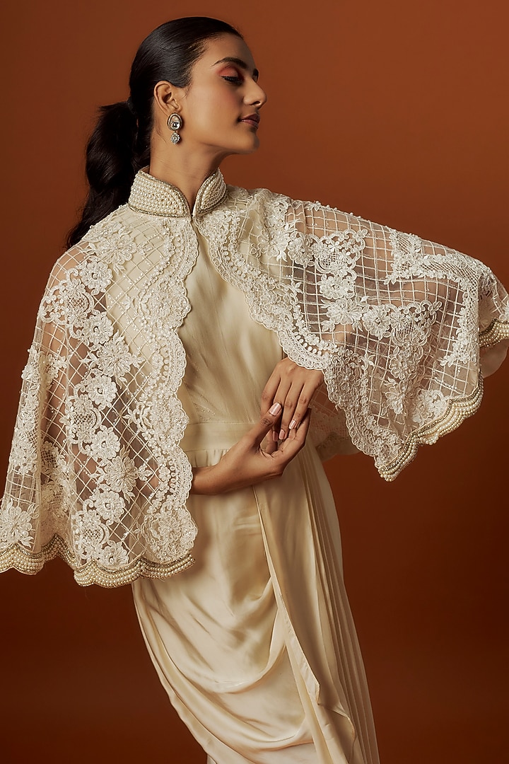 Ivory Satin Draped Engagement Gown With Cape by Rashi Kapoor at Pernia's Pop Up Shop