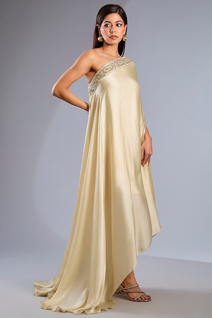 Ivory Satin Embroidered One-Shoulder Poncho by Rashi Kapoor at Pernia's Pop Up Shop