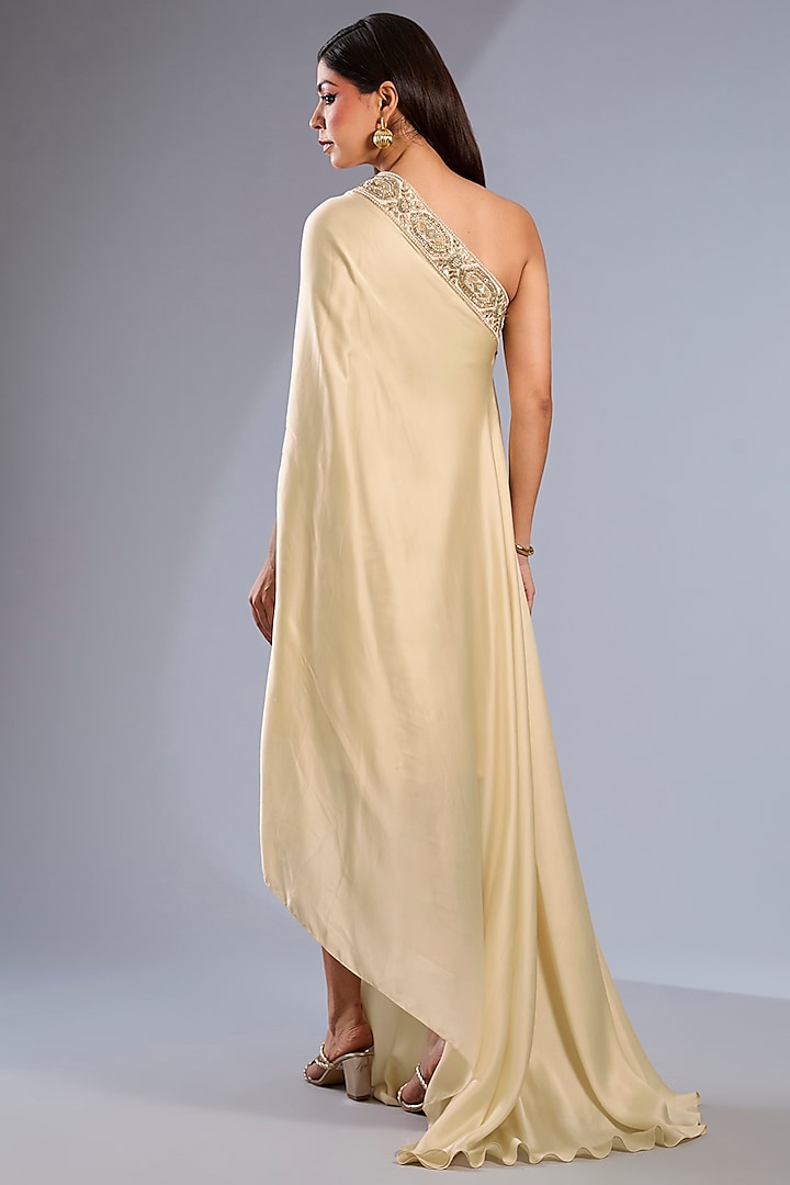 Ivory Satin Embroidered One-Shoulder Poncho by Rashi Kapoor at Pernia's Pop Up Shop