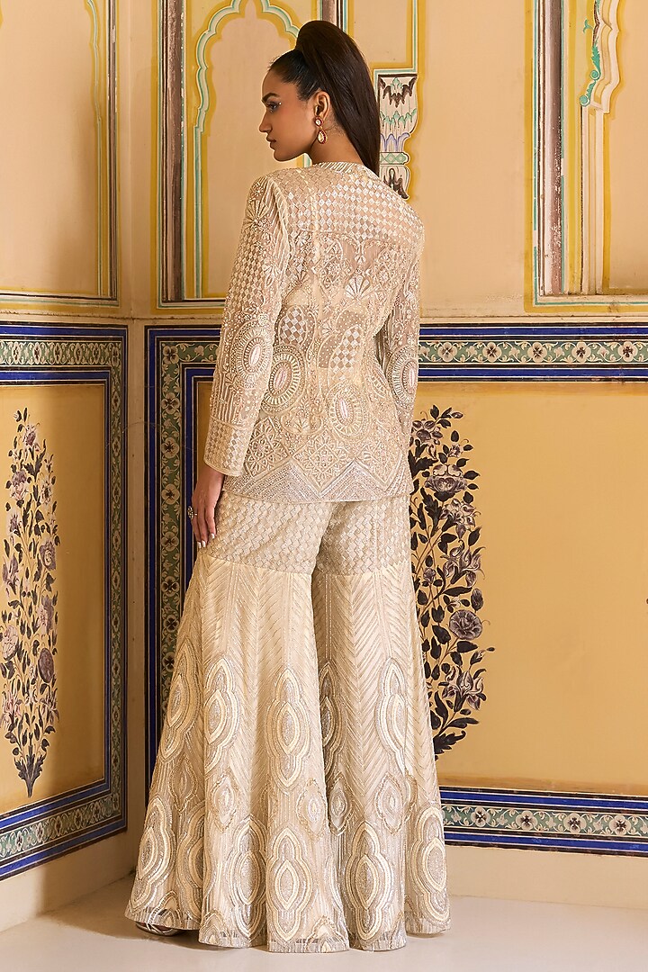 Ivory Net Embroidered Flared Bridal Sharara Set by Rashi Kapoor at Pernia's Pop Up Shop