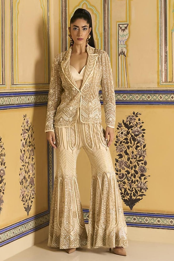 Ivory Net Embroidered Flared Bridal Sharara Set by Rashi Kapoor at Pernia's Pop Up Shop