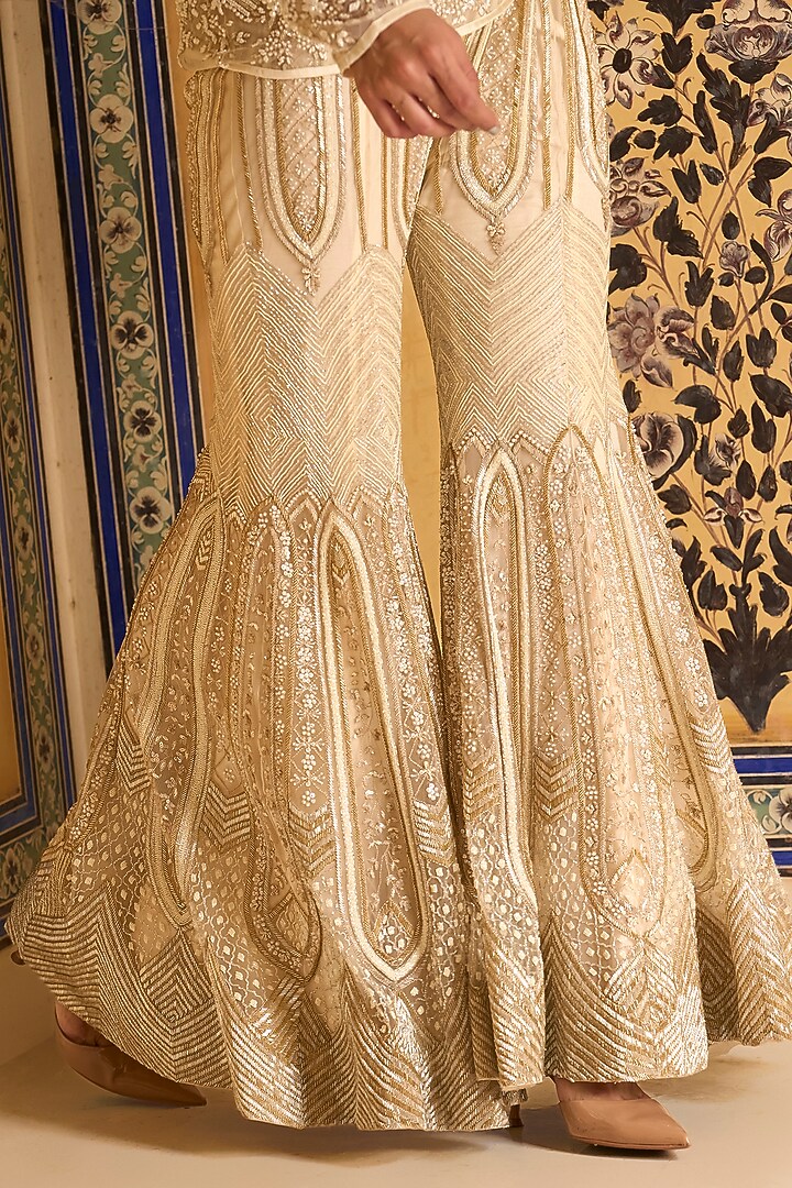 Ivory Net Embroidered Flared Bridal Sharara Set by Rashi Kapoor at Pernia's Pop Up Shop