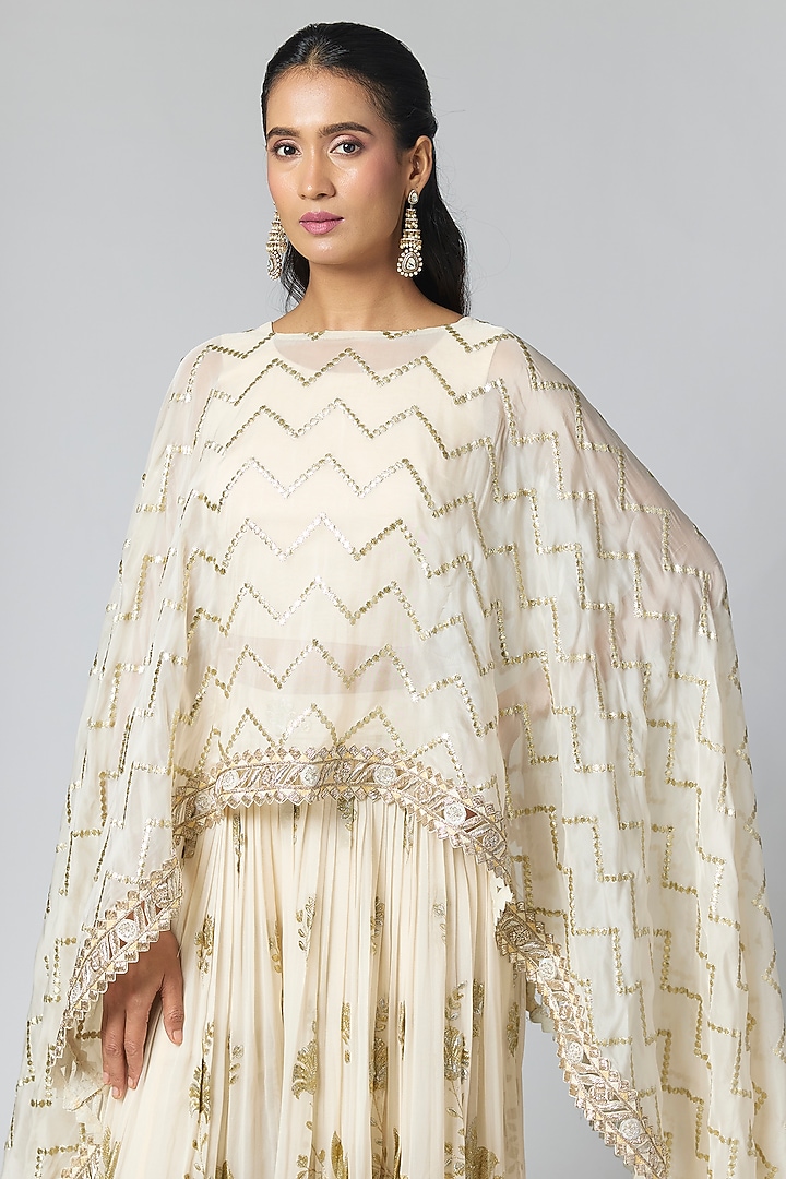 Ivory Organza Embellished Cape Set by Rashi Kapoor at Pernia's Pop Up Shop