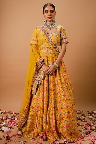 Yellow Silk Patola Printed Lehenga Set by Ria Shah Label