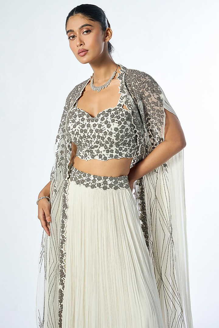 Ivory Georgette Cutdana & Beads Embroidered Jacket Wedding Lehenga Set by Rishi & Soujit at Pernia's Pop Up Shop