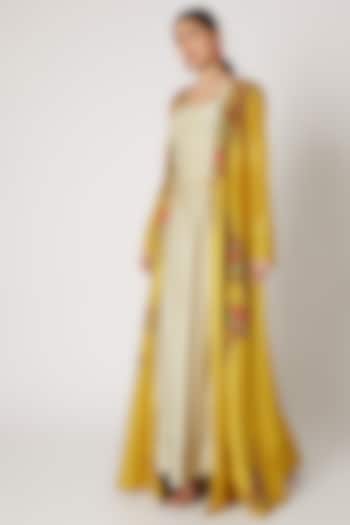 Beige Slip Dress With Yellow Embroidered Jacket by Rishi & Soujit