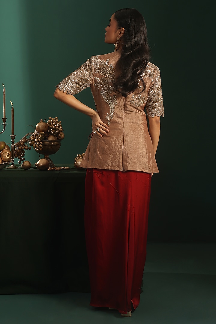 Maroon Tissue & Bemberg Satin Cutdana Embroidered Draped Skirt Set by Rishi & Soujit at Pernia's Pop Up Shop