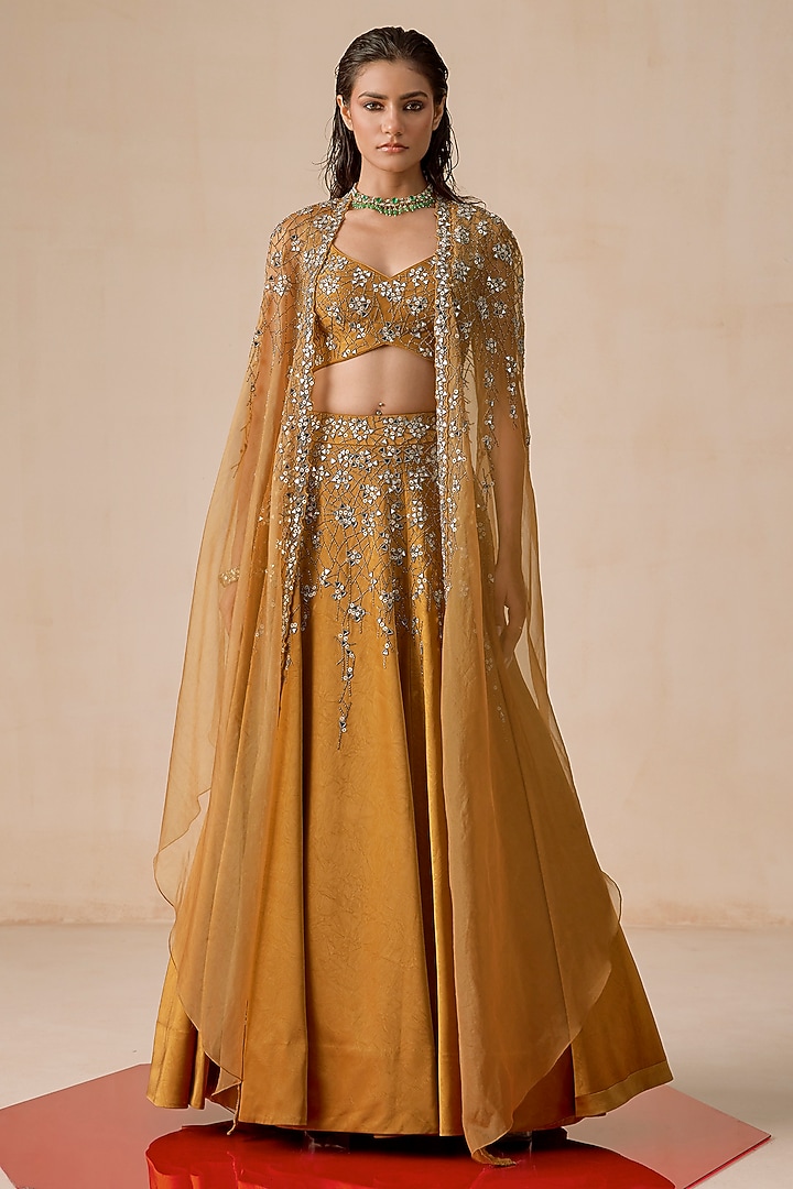 Dark Mustard Textured Jacquard Cutdana Hand Embroidered Wedding Lehenga Set by Rishi & Soujit at Pernia's Pop Up Shop