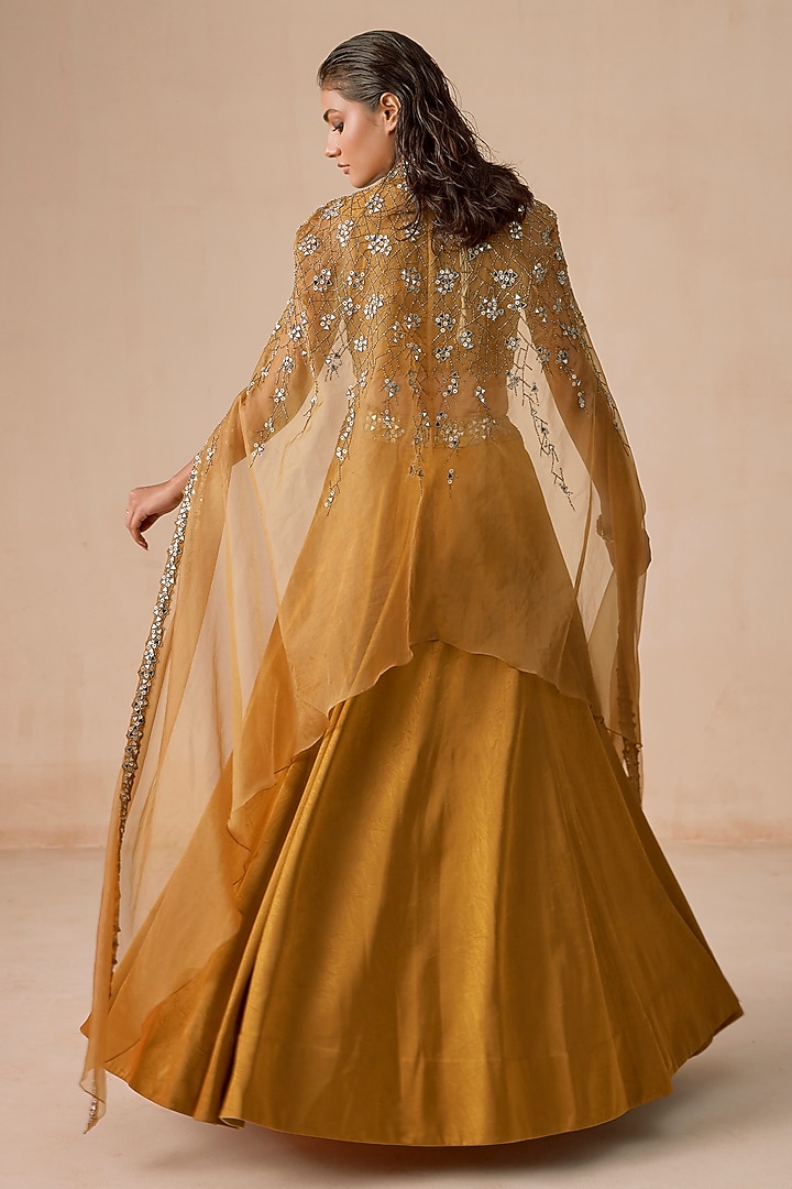 Dark Mustard Textured Jacquard Cutdana Hand Embroidered Wedding Lehenga Set by Rishi & Soujit at Pernia's Pop Up Shop