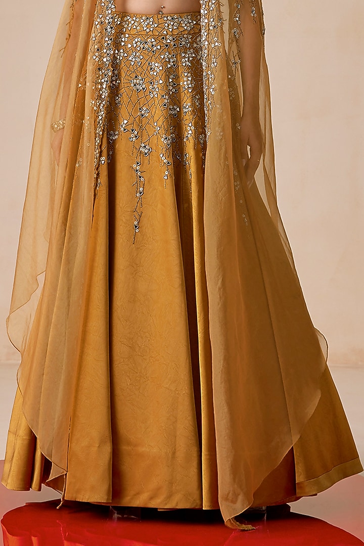 Dark Mustard Textured Jacquard Cutdana Hand Embroidered Wedding Lehenga Set by Rishi & Soujit at Pernia's Pop Up Shop