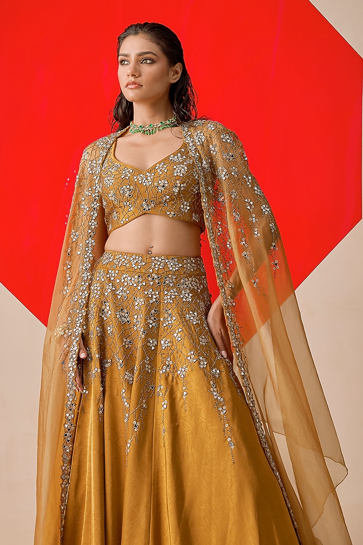 Dark Mustard Textured Jacquard Cutdana Hand Embroidered Wedding Lehenga Set by Rishi & Soujit at Pernia's Pop Up Shop
