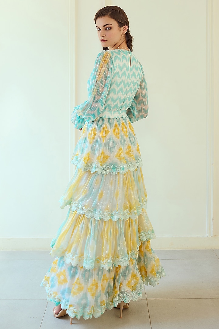 Blue & Yellow French Chiffon Ikat Printed Maxi Tiered Party Wear Dress With Belt by Roseroom by Isha Jajodia at Pernia's Pop Up Shop