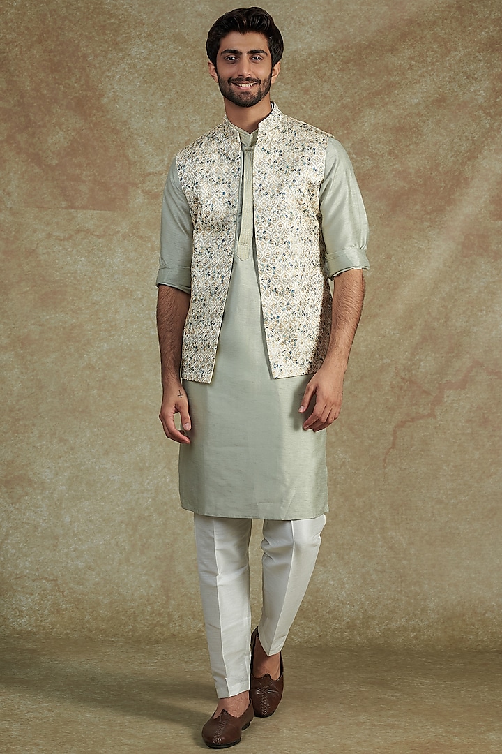 Sage Green Raw Silk Embroidered Bundi Jacket With Kurta Set by RNG Safawala Men