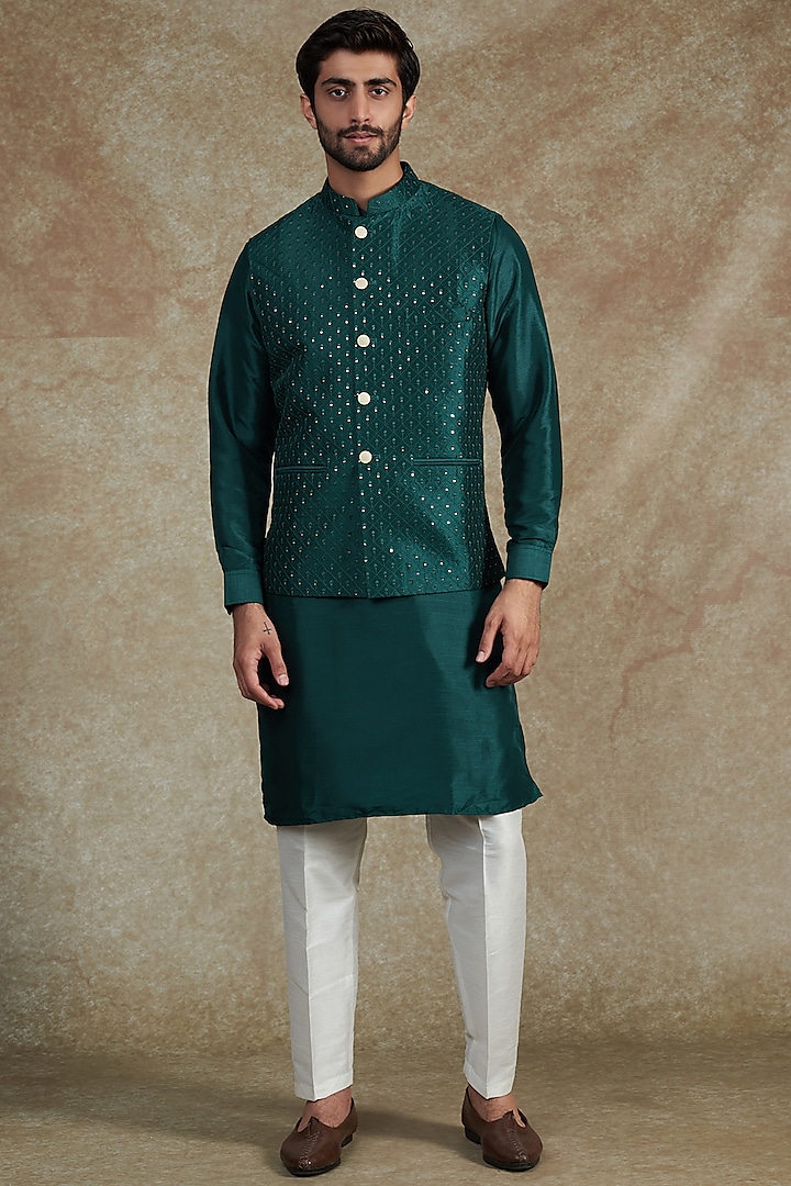 Teal Green Raw Silk Embroidered Bundi Jacket With Kurta Set by RNG Safawala Men