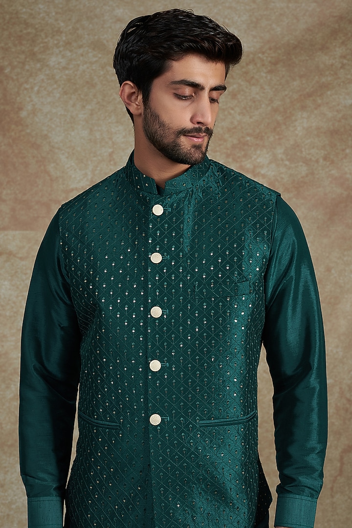 Teal Green Raw Silk Thread Embroidered Bundi Jacket Set by RNG Safawala Men at Pernia's Pop Up Shop