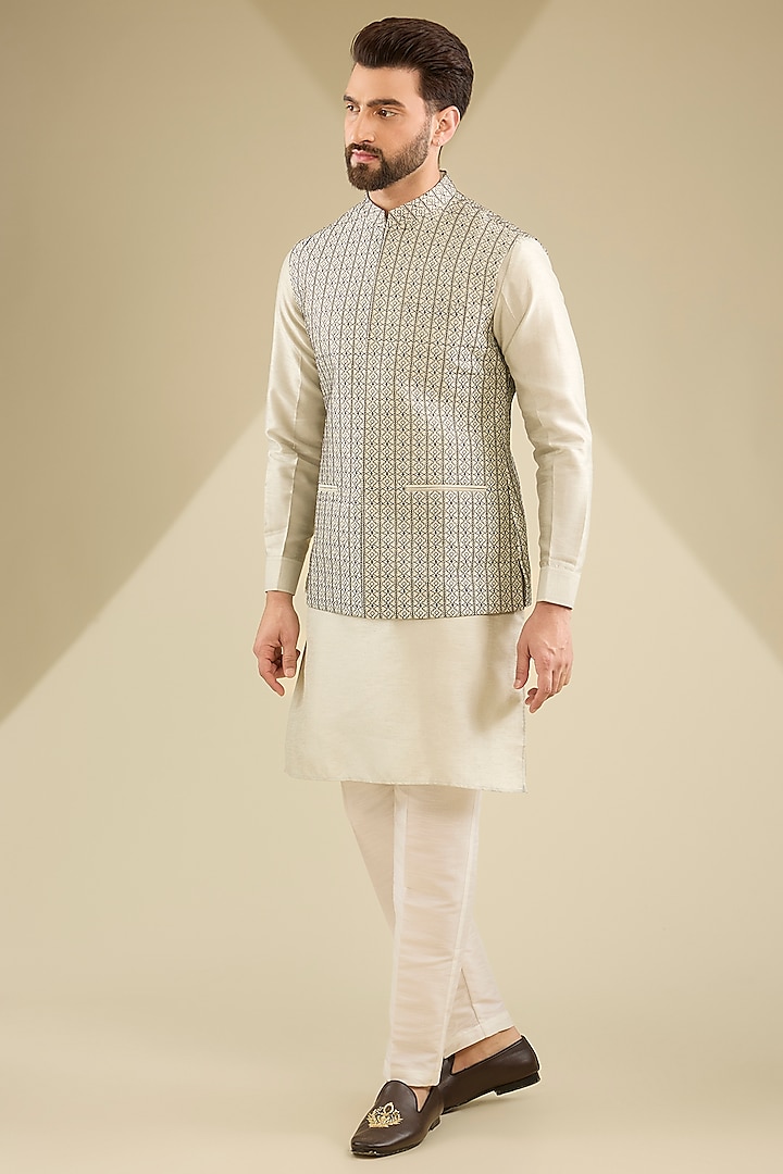 Beige Raw Silk Thread Embroidered Bundi Jacket Set by RNG Safawala Men