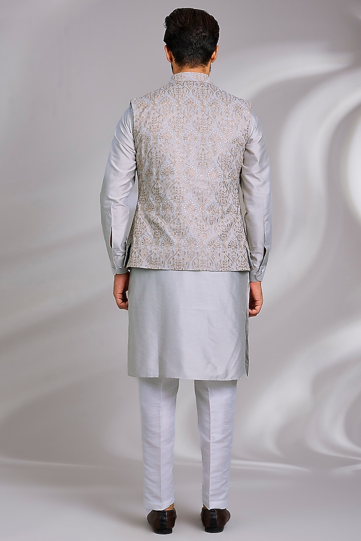 Grey Raw Silk Resham Embroidered Bundi Jacket Set by RNG Safawala Men at Pernia's Pop Up Shop