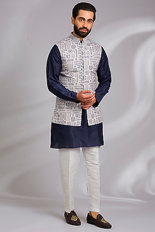 Off-White Linen Silk Tribal Printed Bundi Jacket Set by RNG Safawala Men
