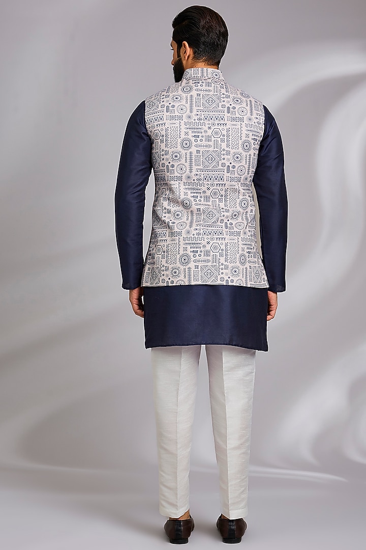 Off-White Linen Silk Tribal Printed Bundi Jacket Set by RNG Safawala Men at Pernia's Pop Up Shop