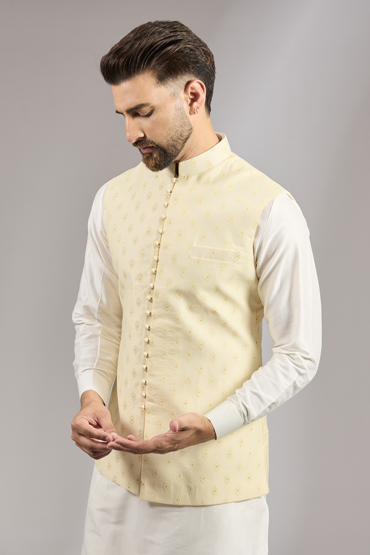 Cream Brocade Silk Motif Embroidered Bundi Set by RNG Safawala Men