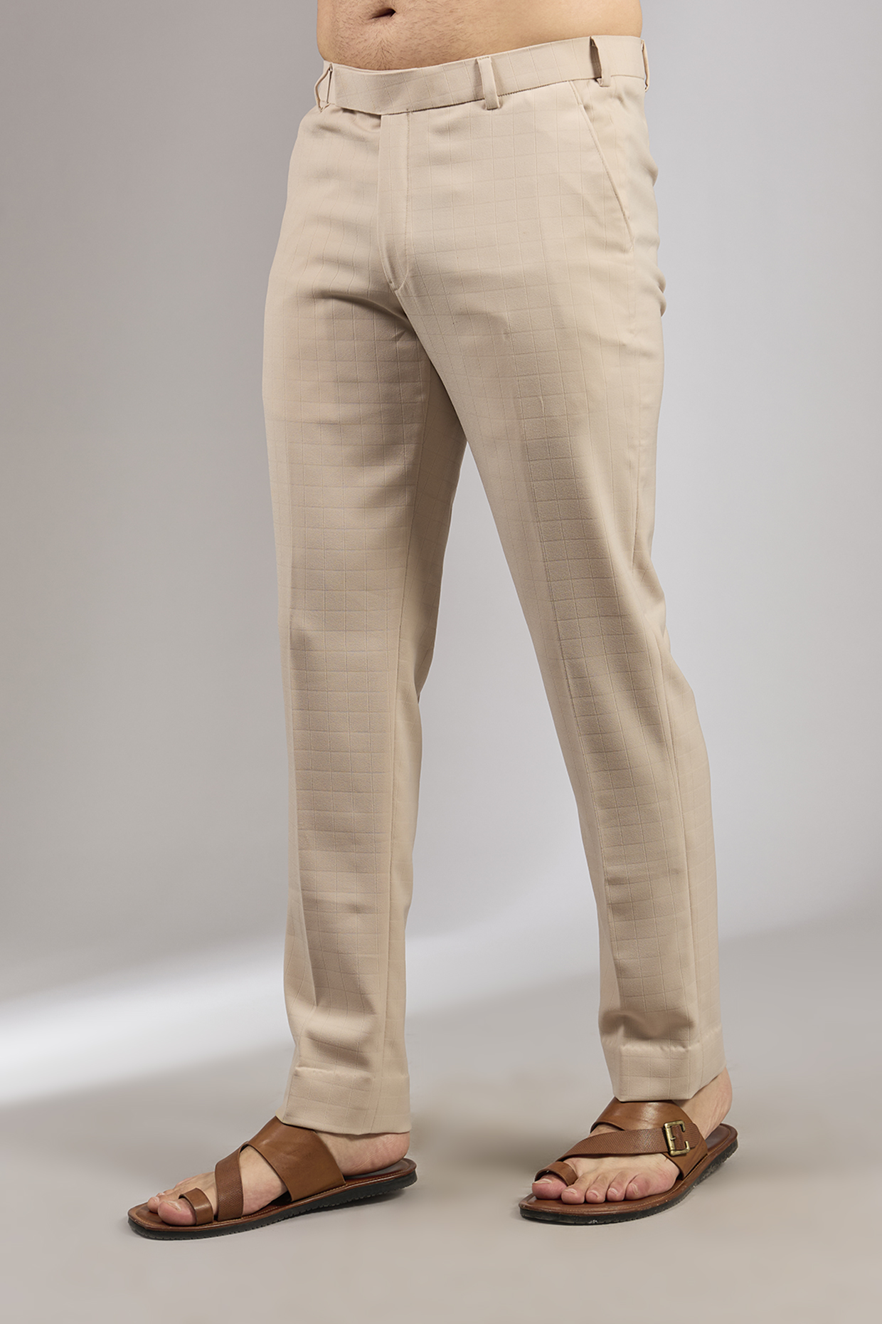 Beige French Terry Tapered Pants by RNG Safawala Men