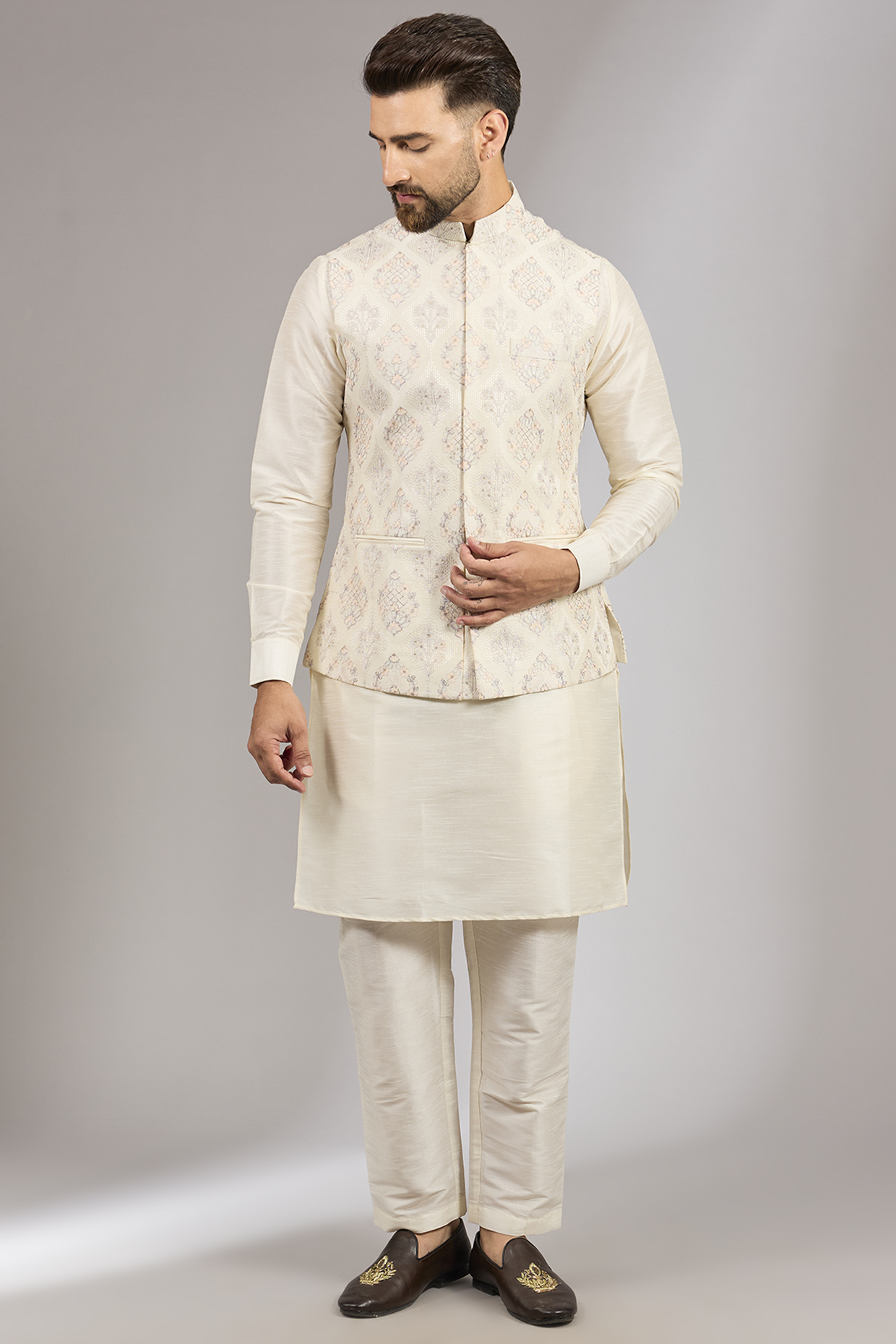 Cream Raw Silk Sequins Embroidered Bundi Set by RNG Safawala Men