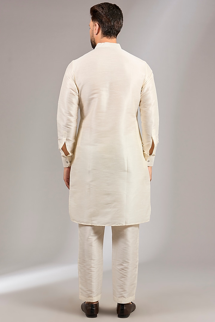 Cream Raw Silk Sequins Embroidered Bundi Set by RNG Safawala Men at Pernia's Pop Up Shop