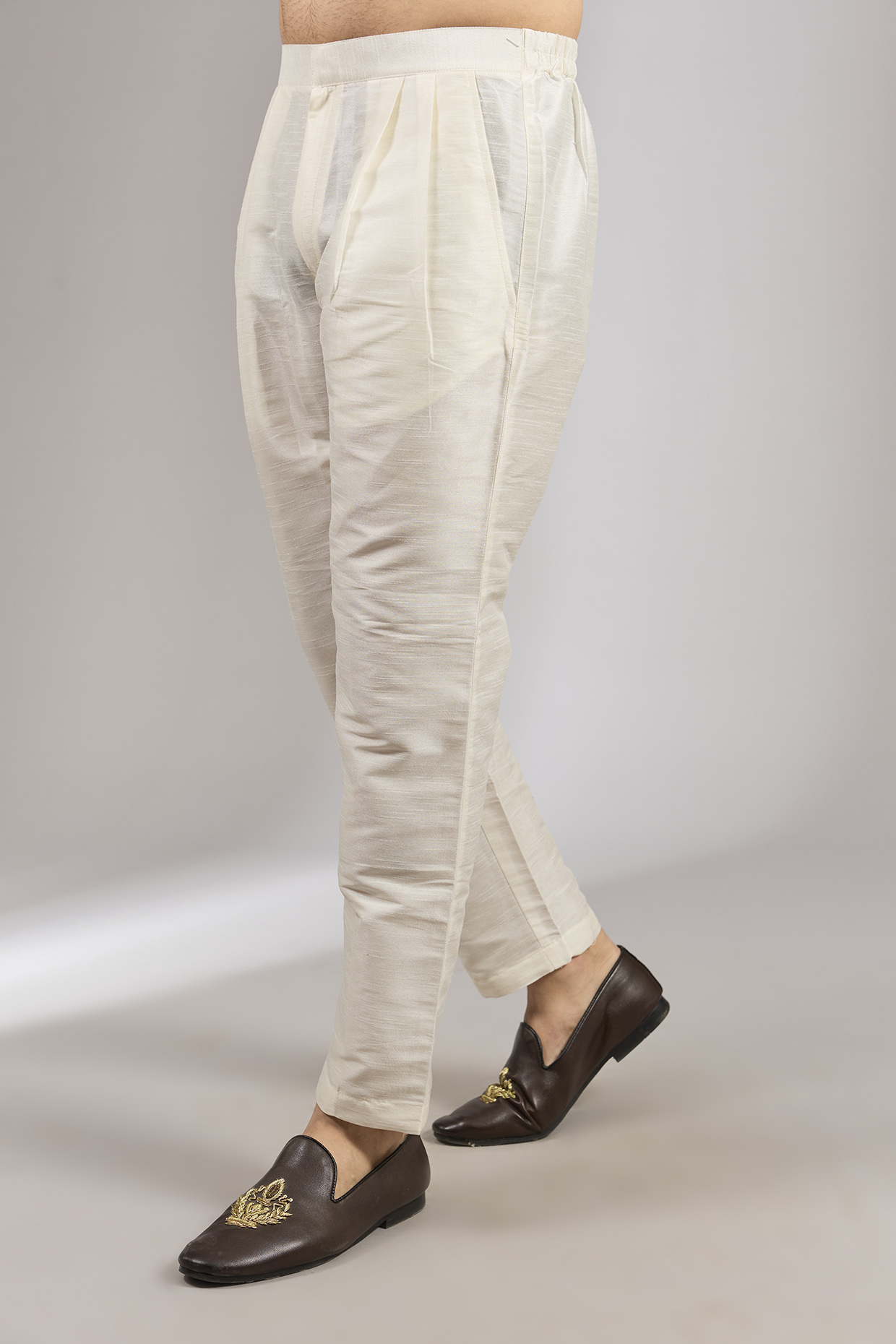 Cream Dupion Silk Pencil Pants by RNG Safawala Men